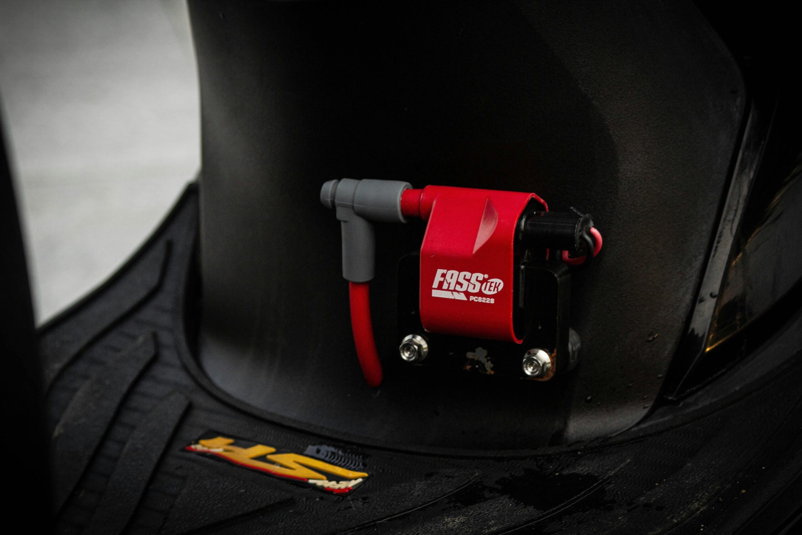 Close-up shot of a high-performance MotoGP bike engine with intricate components visible