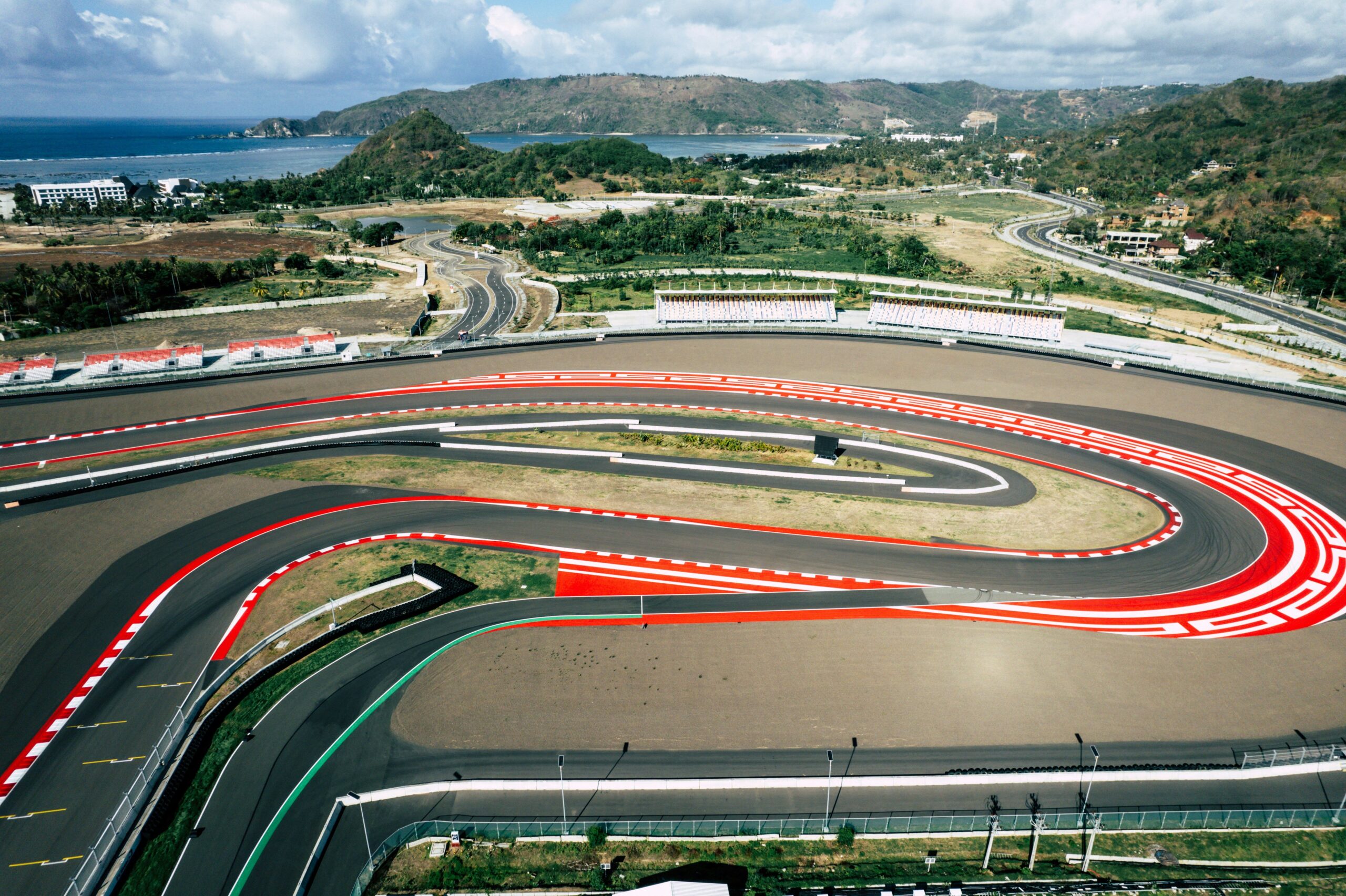 Infographic showing variations in MotoGP track layouts including twists, turns, and straights