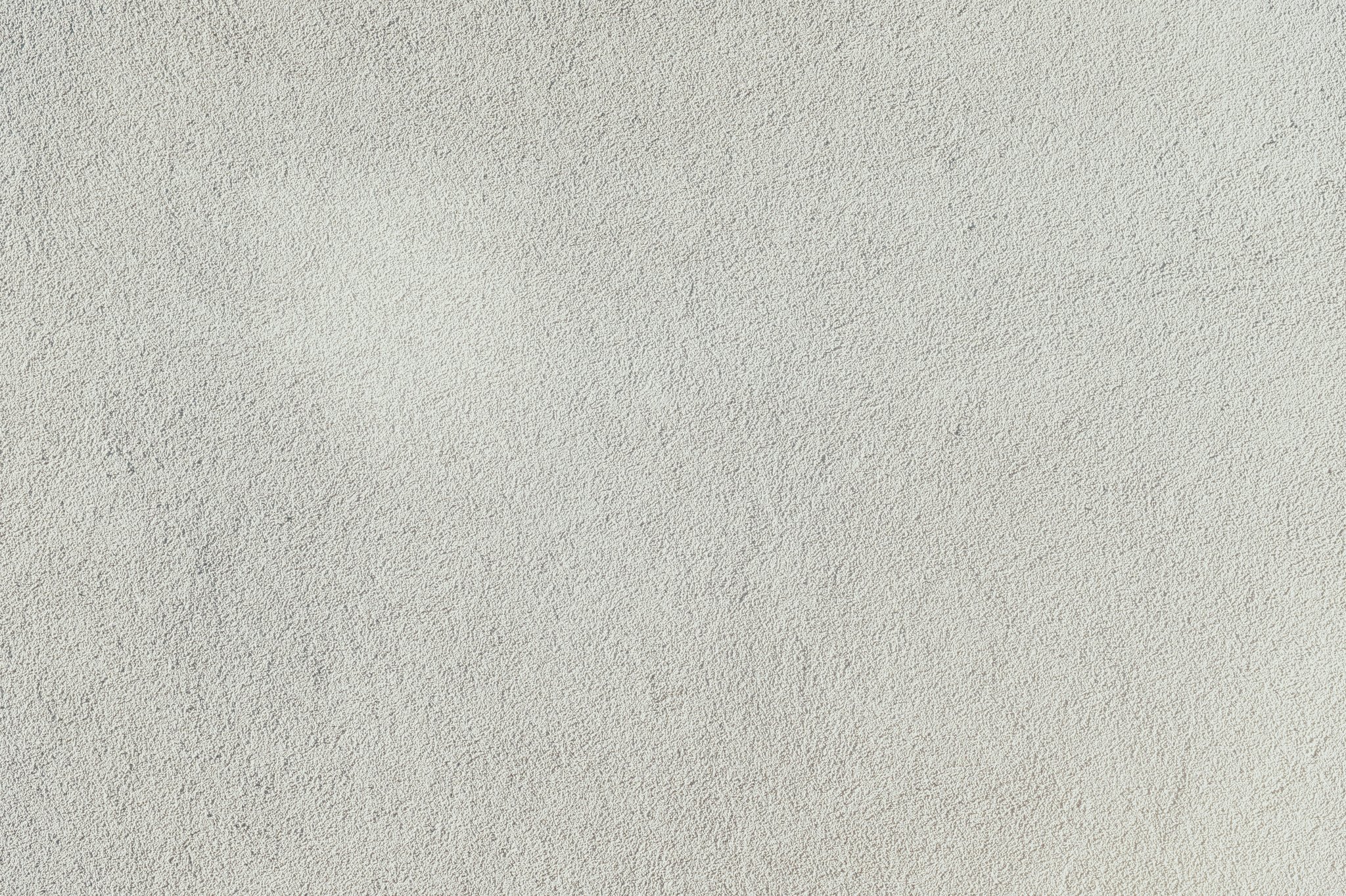 A close-up image showing textured asphalt on a MotoGP track