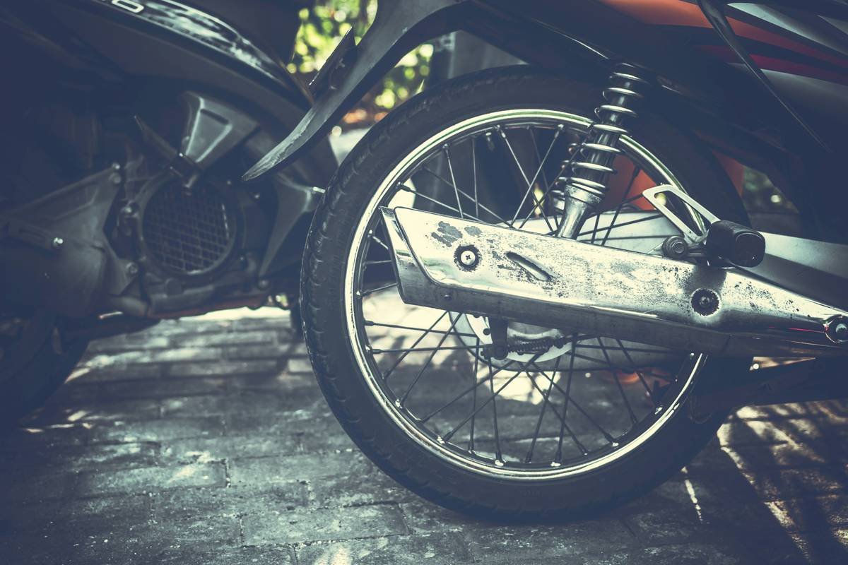 Close-up of sleek carbon fiber frame used in MotoGP bikes