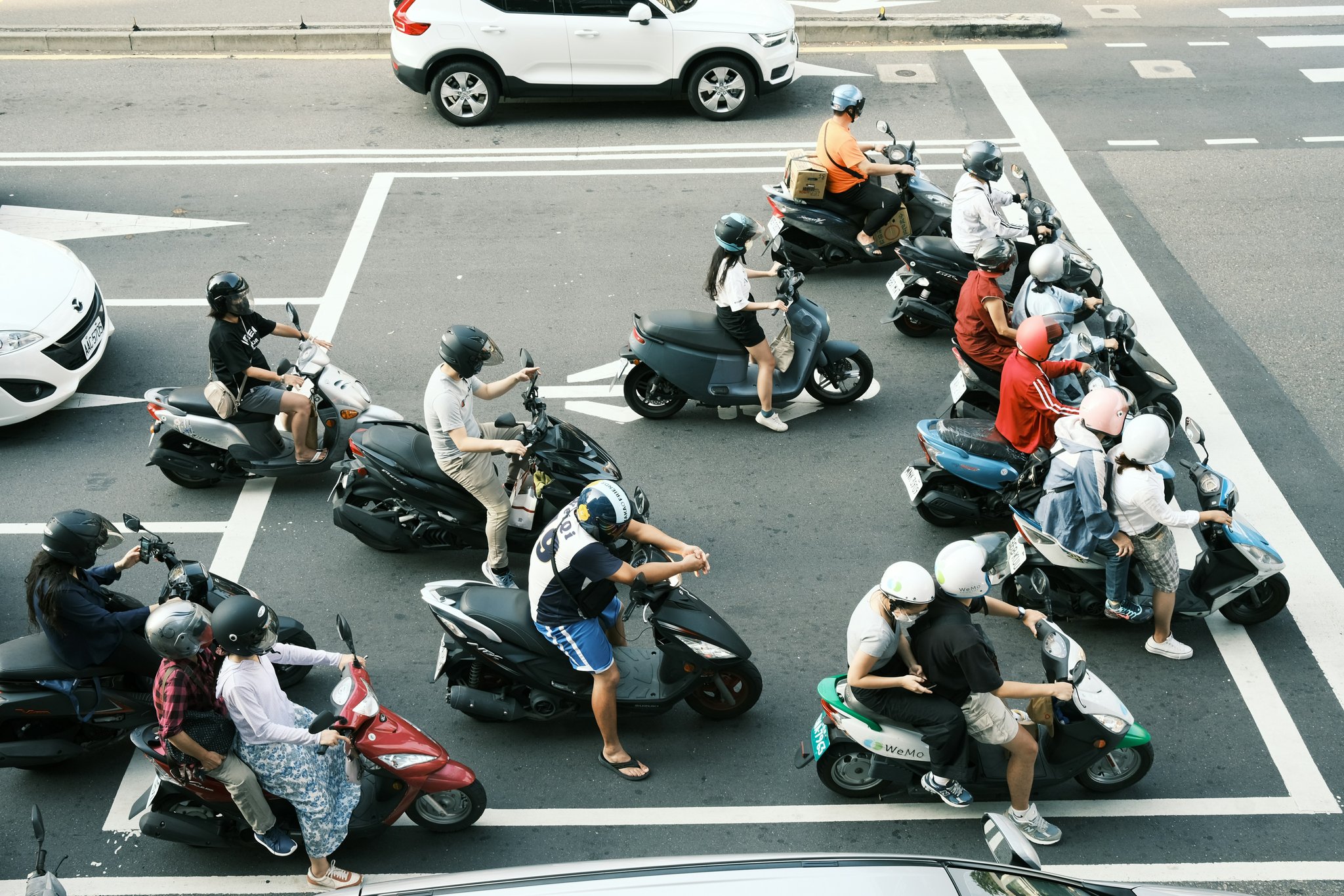 Close-up shot of a MotoGP rider's perfect cornering posture