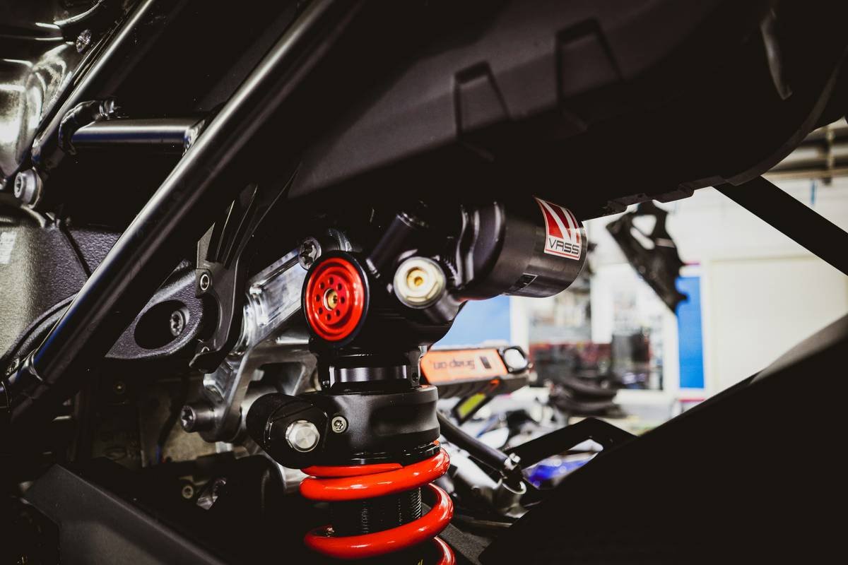 Close-up shot of high-performance MotoGP bikes lined up at starting grid