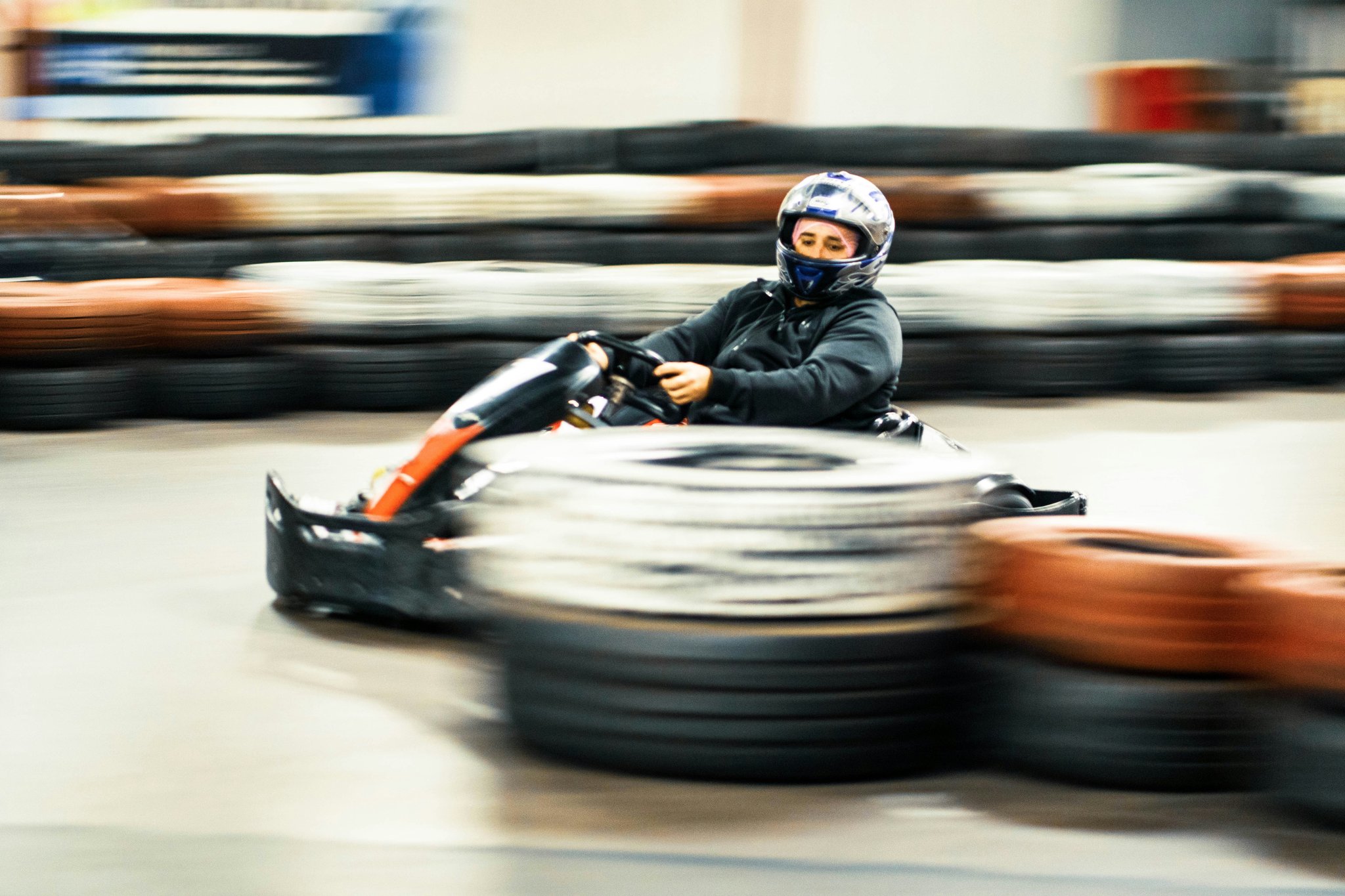 MotoGP rider performing intense workout routine at the gym