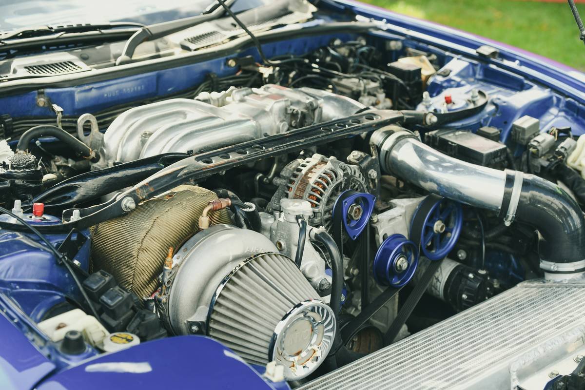 Ducati engineers reviewing data with Lenovo laptops during a race weekend